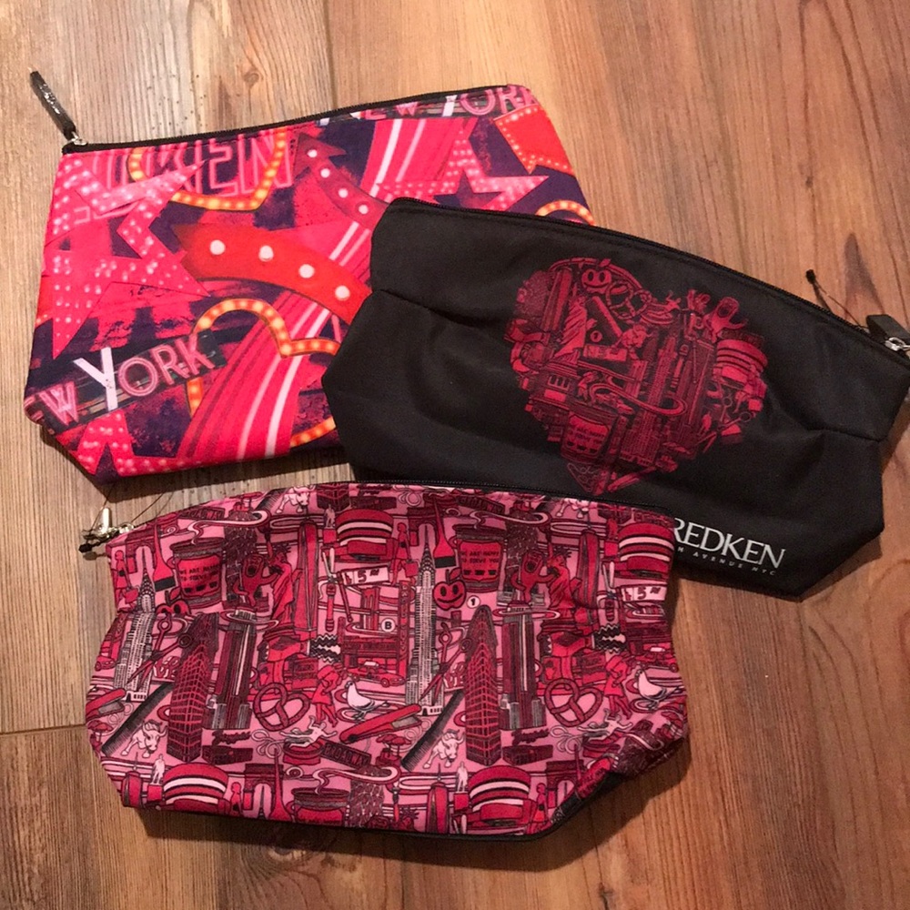 3 REDKEN cosmetic bags!